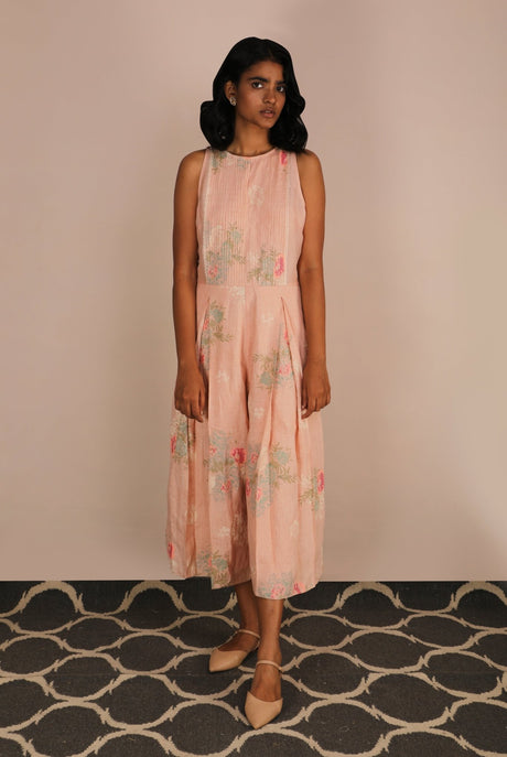 Model wearing the peach Florence rose print jumpsuit, full length front view