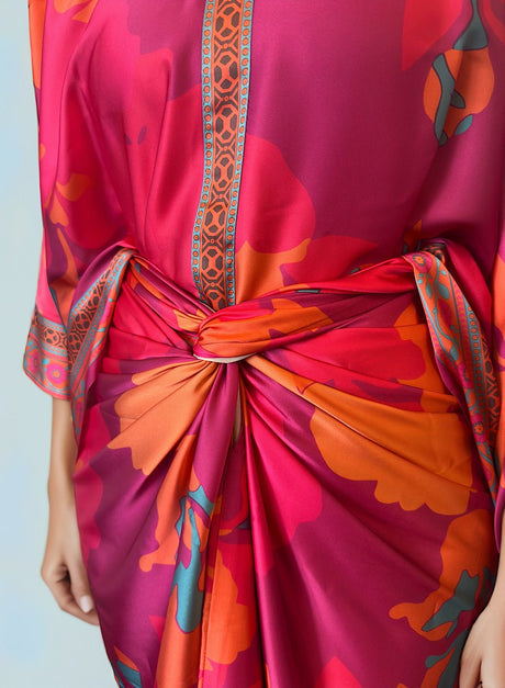 Close-up of the Fuchsia Co-ord Set twisted knot waist and embroidered placket trim