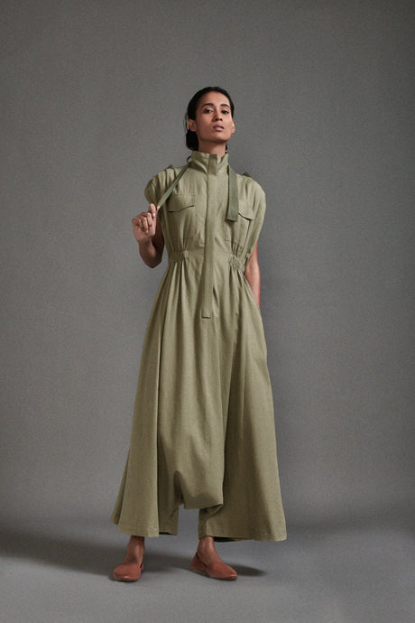 Model wearing the Green Safari Sphara Jumpsuit, front view showing the zip front and gathered waist