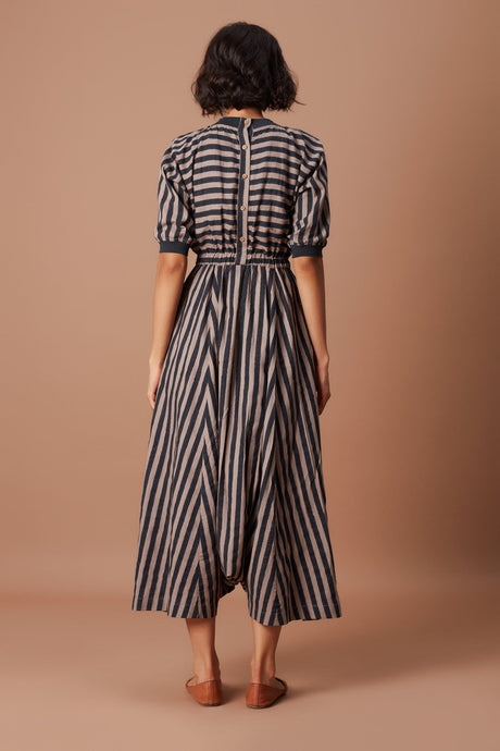 Back view of the Grey and Charcoal Striped Mati Sphara Jumpsuit showing the back button placket