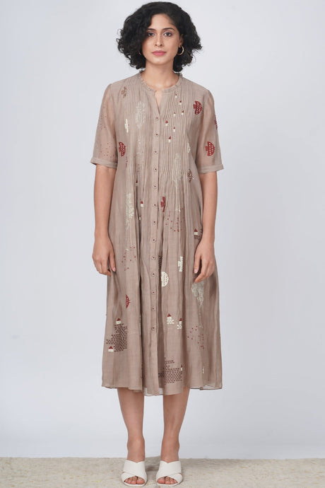 Hakoni print pleated dress in cotton chanderi from ARCVSH by Pallavi Singh in taupe with red motifs, front view