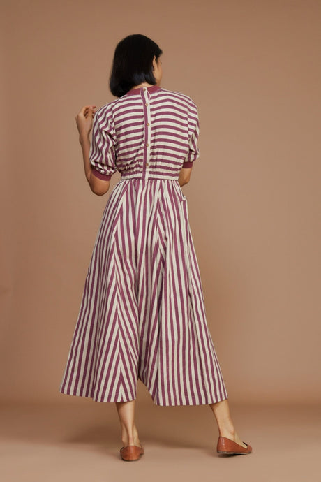 Back view of the Ivory and Mauve Striped Mati Sphara Jumpsuit showing the back button closure