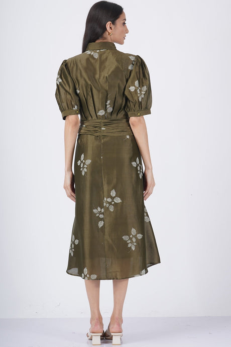 Leaf printed puff sleeve dress back view with tied waist, model wearing it