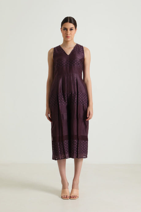 Lavender Lace Jumpsuit from ARCVSH by Pallavi Singh in deep plum with a V-neck and lace hem, model wearing it, front view