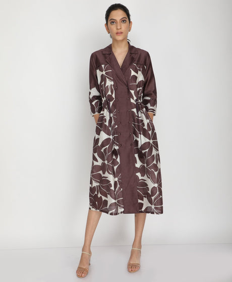 Grape Lotus print midi dress with solid centre placket, model with hands in pockets, front view