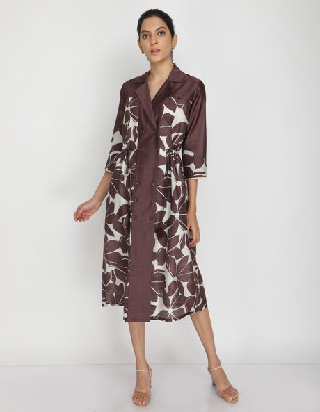 Lotus print dress with three-quarter sleeves and wrap collar, model walking, front view