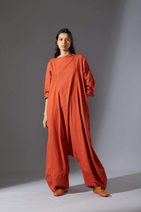 Mati Slv Suga Rust Jumpsuit from MATI, rust long sleeve jumpsuit with balloon legs, front view