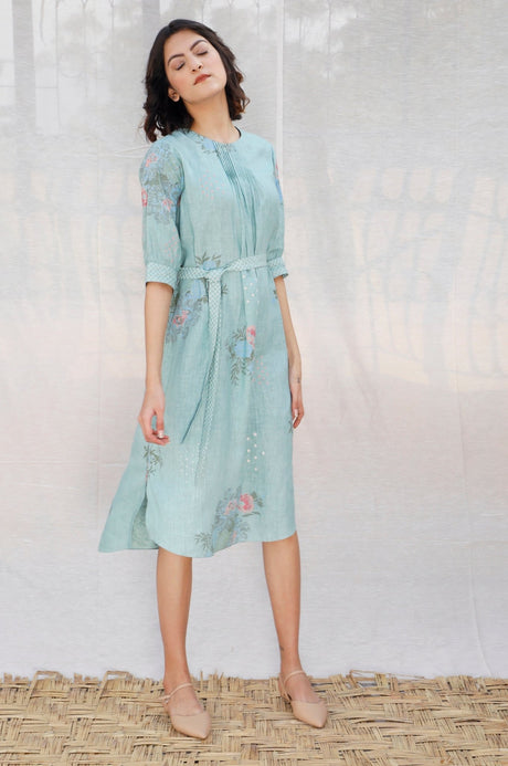 Mint Front Pleat Slip Linen Dress with curved side slit hem, model standing, front view