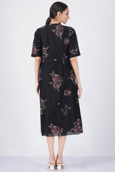 Multicolor rose printed pleated dress back view with scattered roses