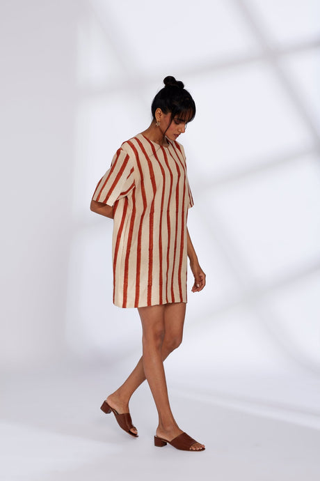 Model walking in the striped Oasis White Dress, three quarter view