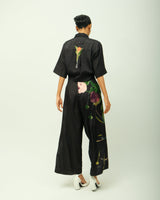 Psyflora shirt set back view showing the painted flower on the shirt and floral trousers