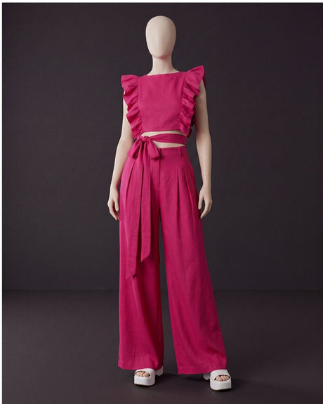 Overlap Cotton Top in hot pink styled with matching wide trousers on a mannequin, full length