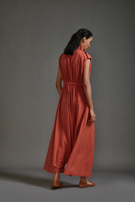 Back view of the Rust Safari Sphara Jumpsuit showing the elasticated back waist