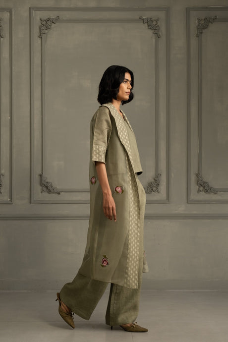 Sage Green Applique Work Embroidered Jacket with Top and Flared Pant in Linen by ARCVSH by Pallavi Singh, side view
