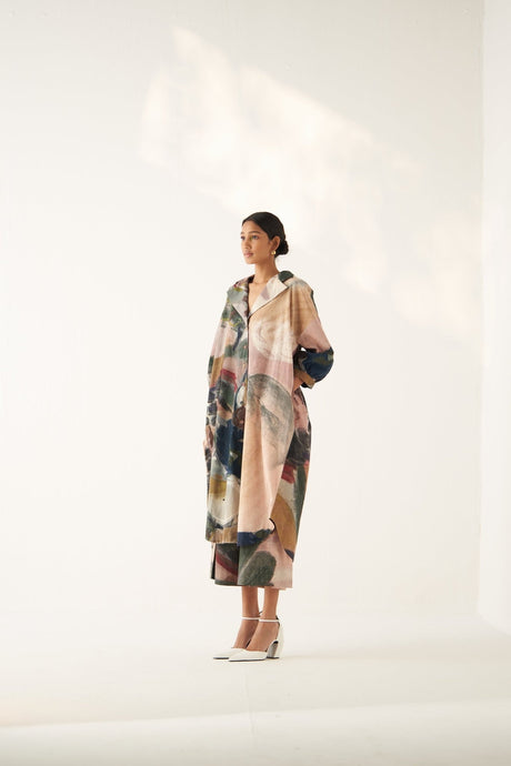 Model wearing the Wallflower Trench Set, three quarter view with hand in pocket