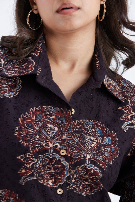 Close-up of the Yuna Black co-ord set shirt collar, buttons and rust floral print