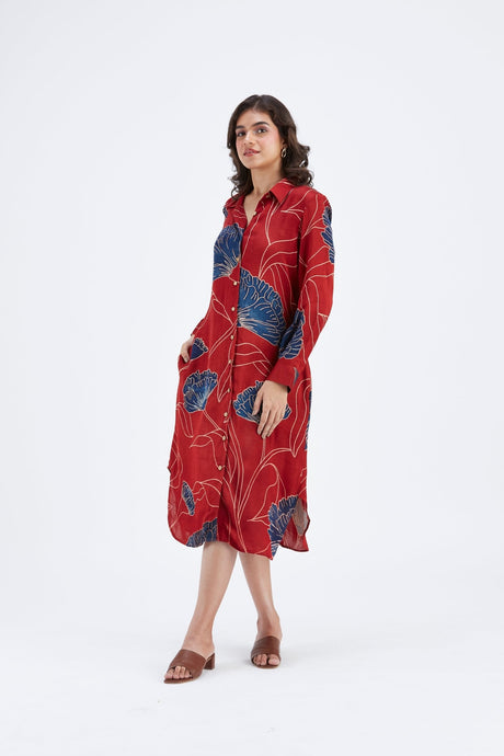Red Zae dress with button front and side pocket, three quarter view