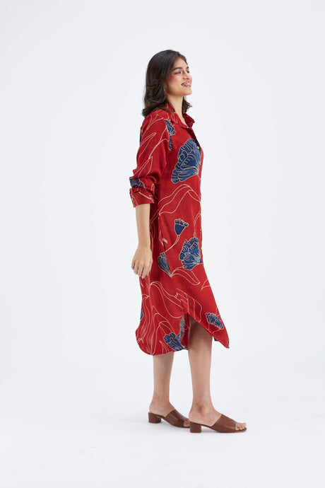 Side view of the red Zae shirt dress showing the curved hem and side slit