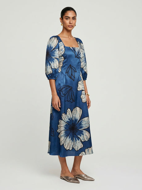 Zoe Blue Modal Dress by Hasttvam, blue midi with large cream florals, square neck and puff sleeves, front view